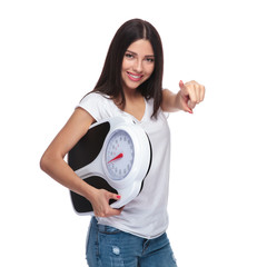 Wall Mural - cute brunette woman wants you to make a healthy choice