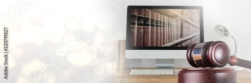 Fotografía Gavel and computer with books of law and justice with transition