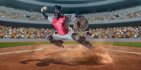 Wall Mural - Baseball player throws the ball on professional baseball stadium