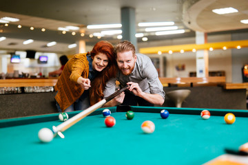 Wall Mural - Couple dating and playing snooker