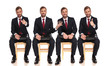 4 poses of the same businessman waiting on a chair