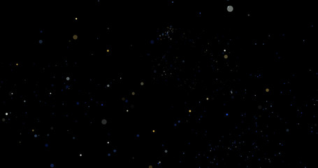 Wall Mural - flying dust particles on a black background