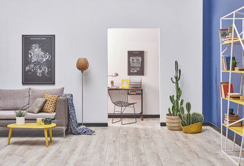 working and study corner in the living room. white and blue style.