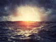 Sunset on stormy sea
