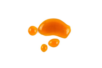 Wall Mural - drop of caramel isolated on white background