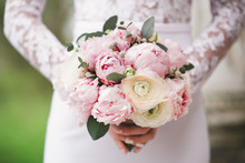 Beautiful Wedding Bouquet For The Bride With Pink Peonies And White Peony Roses