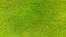 Aerial. View Above Of A Green Grass Texture Background.