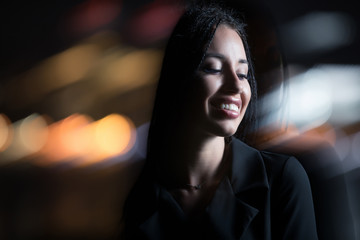 Wall Mural - Smiling unusual woman in night city