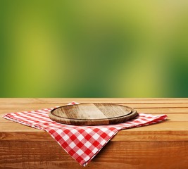 Canvas Print - Empty tray on tablecloth on wooden table