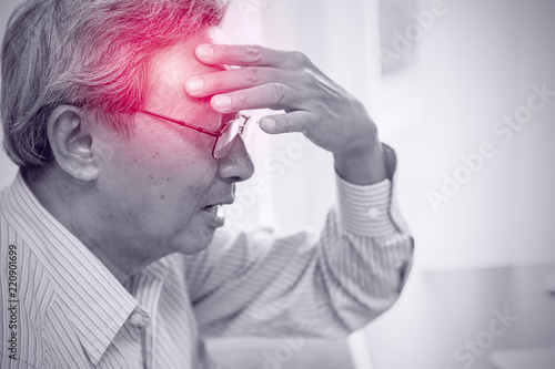 Cuadros en Lienzo Asian elder pain from headache stress danger of stroke syndrome