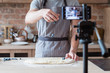 © golubovy - online culinary show. blogging and live video streaming. chef showing the process of blueberry pie cooking.