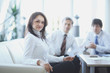 © yurolaitsalbert - portrait of business woman on the background of colleagues