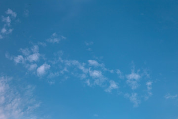 white clouds in the blue sky