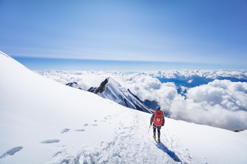 trekking to the top of mont blanc mountain in french alps