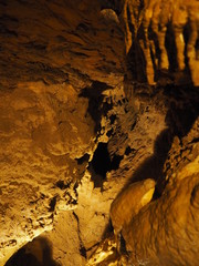 Wall Mural - View on the inside of a very old stone cave