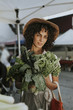 © Rawpixel.com - Beautiful woman buying kale at a farmers market