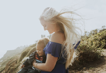 Wall Mural - Blonde mom with her son outdoors