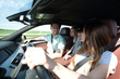 © ASDF - happy mom driving a family car