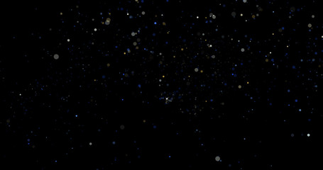 Wall Mural - Flying dust particles on a black background