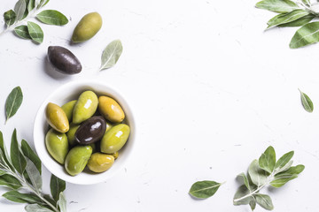 Black and green Olives  on white background.