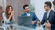 © ASDF - business team holds a business meeting