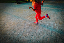 Little Girl Playing Hopscotch On Playground, Outdoor Activities