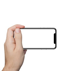 Poster - isolated male hand holding the phone tablet touch computer gadget.