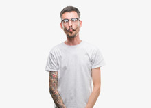 Young Tattooed Adult Man Making Fish Face With Lips, Crazy And Comical Gesture. Funny Expression.