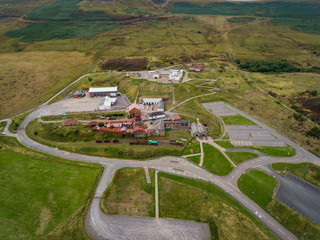 An aerial view of an Old Coal Mine Pit Yard on overcast Day, Blaenavon, Wales