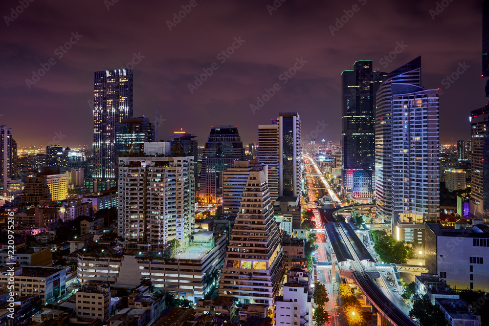 Obraz na płótnie night light urban cityscape skyline in metropolis w salonie