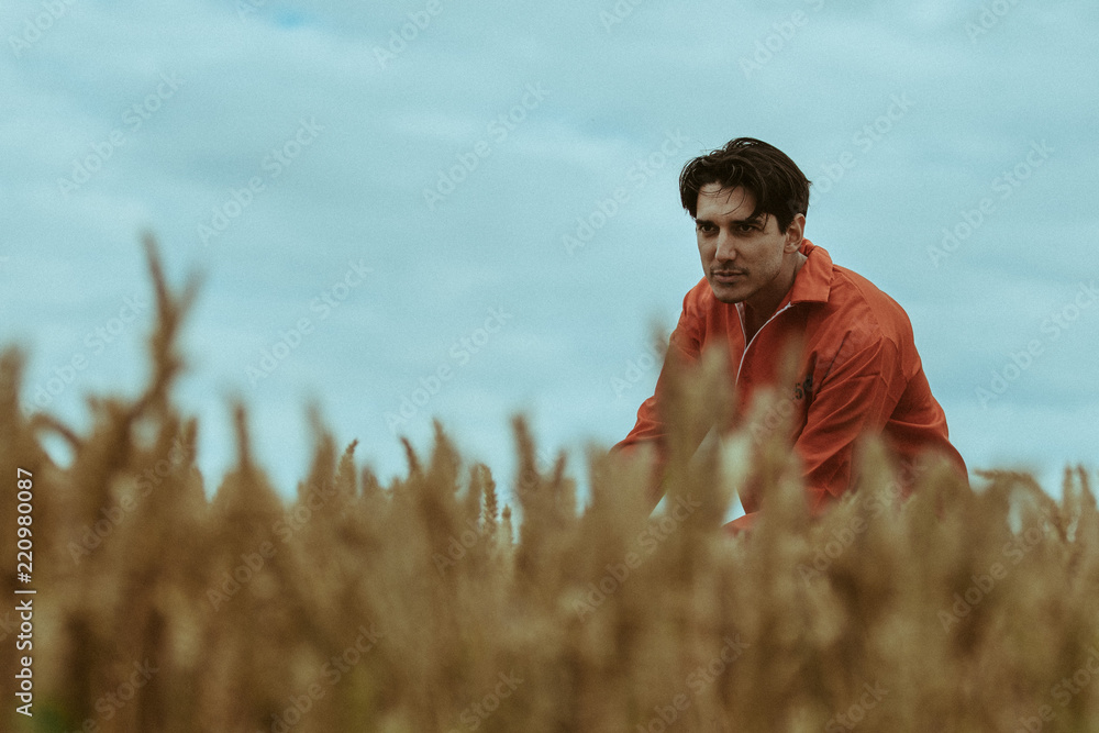 Convict in a cornfield from jail Stock Photo | Adobe Stock