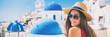 © Maridav - Summer travel tourist girl smiling on Santorini Europe holiday. Vacation panoramic banner landscape on the three blue domes.