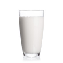 Milk In Glass Isolated On White Background.