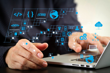 Wall Mural - close up of businessman hand working with laptop computer in modern office