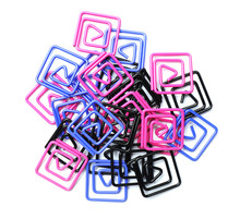 Heap Of Paper Clips On White Background. School Stationery