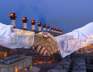 Wall Mural - Handshake multi exposure with a power plant background