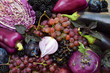 Purple vegetables and fruits. Plum, eggplant, pepper, blueberries, rowanberry. Violet organic foods high in antioxidants, anthocyanins and vitamins. Raw food. Healthy diet superfood concept.