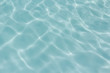 © pandaclub23 - light blue water  texture pattern in swimming pool