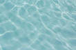 © pandaclub23 - light blue water  texture pattern in swimming pool