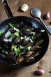 Mussels stewed with greens and white wine
