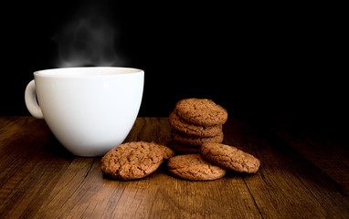 Homemade Chocolate Cookies Eat with hot Coffee on wooden background