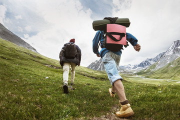 Wall Mural - tourists at trekking route in mountains