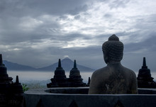 Figure Of Buddha In Cloudy Weather