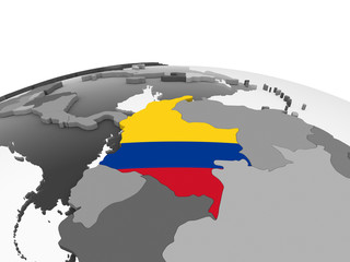 Colombia with flag on globe