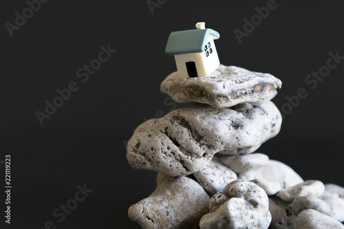 Cuadros en Lienzo house on the edge of the abyss on a black background