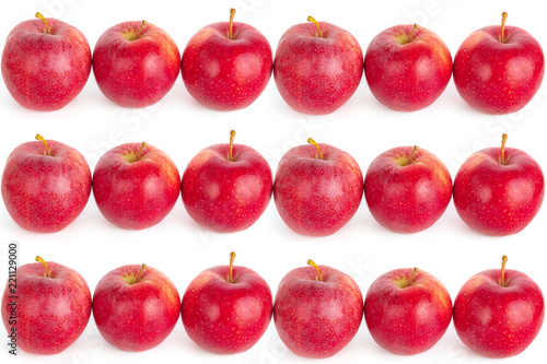 red ripe apples on a white background