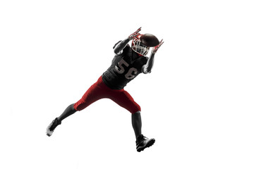 Wall Mural - Active one american football player isolated on white background. Fit caucasian man in uniform running over studio background in jump or motion. Human emotions and facial expressions concept