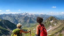 Two Women Hikers On The Trail Of  Pic Du Midi De Bigorre In The Pyrenees