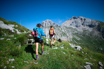 trekking of two coworkers working in the mountains on a day off
