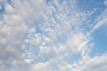 White fluffy clouds in the blue sky